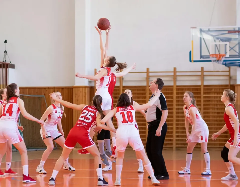 Two basketball teams competing against each other.