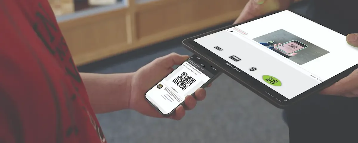 Man buying tickets on his phone through the Eventlink® app