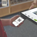 Man buying tickets on his phone through the Eventlink® app