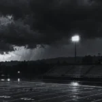 Storm gathering over a field.
