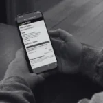 Fan holds a smartphone showing an Eventlink ticket purchase page for a school event.